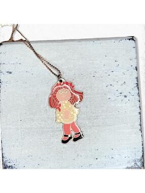 5672gc. Yellow Cabbage Patch Doll Necklace Vintage